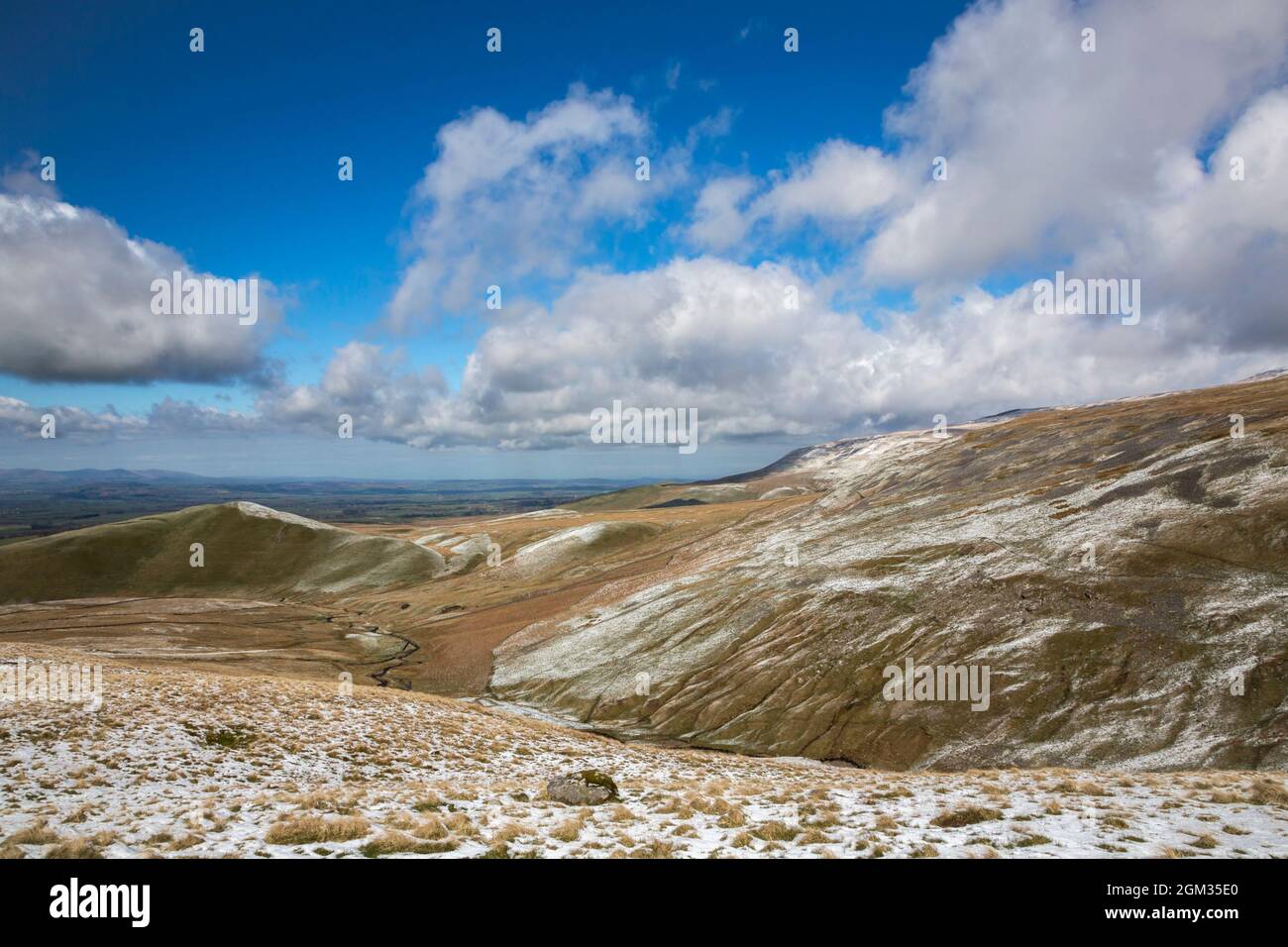 Dun Fell with light spring snow cover, Cumbria, UK Stock Photo