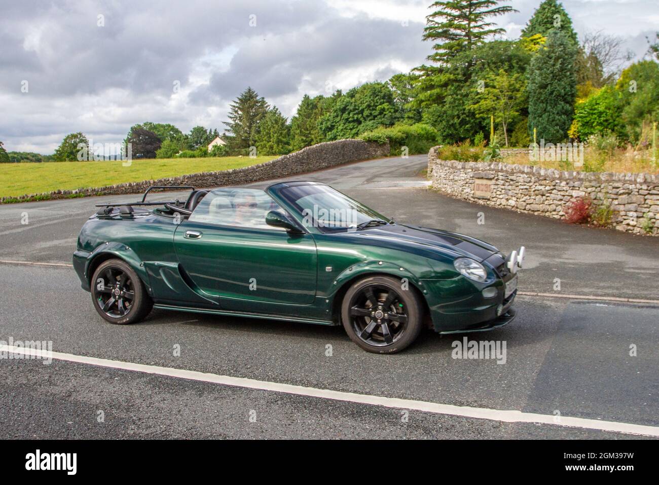 2001 green MG MGF 5 speed manual 1796cc petrol cabrio en-route to Leighton Hall classic July car show Carnforth, UK Stock Photo