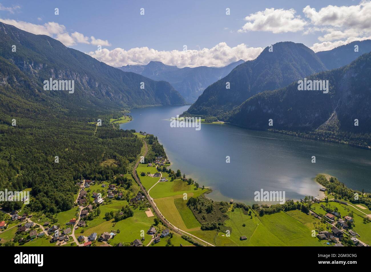 Aerial view of Hallstatter See or Lake Hallstatt and big mountains Alps next to village Hallstatt in Austria, travel and nature concept Stock Photo