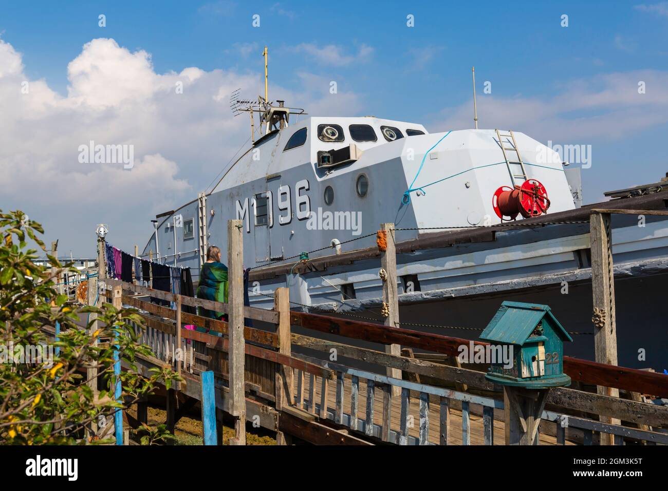 Shoreham-On-Sea, West Sussex UK. 16th September 2021. UK weather: warm and sunny at Shoreham-On-Sea, Shoreham By Sea, with unusual colourful houseboats on the estuary of the River Adur contrasting against the blue sky. Credit: Carolyn Jenkins/Alamy Live News Stock Photo