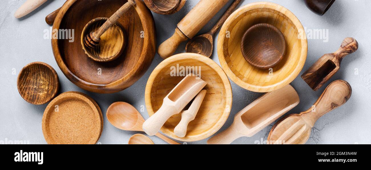 Wooden empty dishes for cooking on gray concrete background. Zero waste concept. Flat lay. Stock Photo