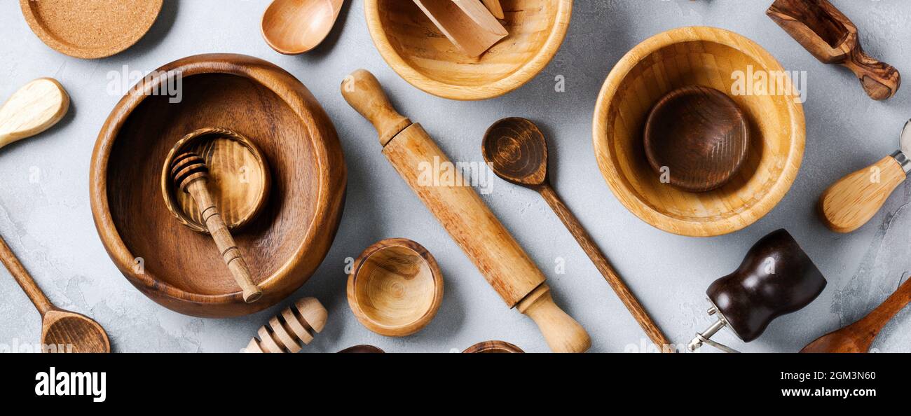 Wooden empty dishes for cooking on gray concrete background. Zero waste concept. Flat lay. Stock Photo