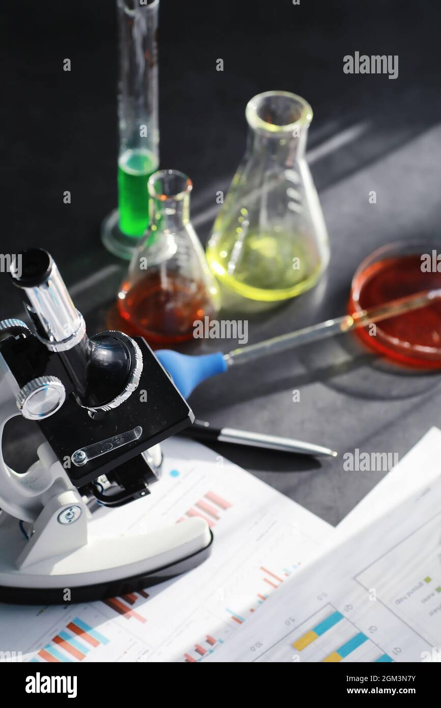 Drug Testing Microscope Laboratory research. Drug testing. Chemical experiments in the ...