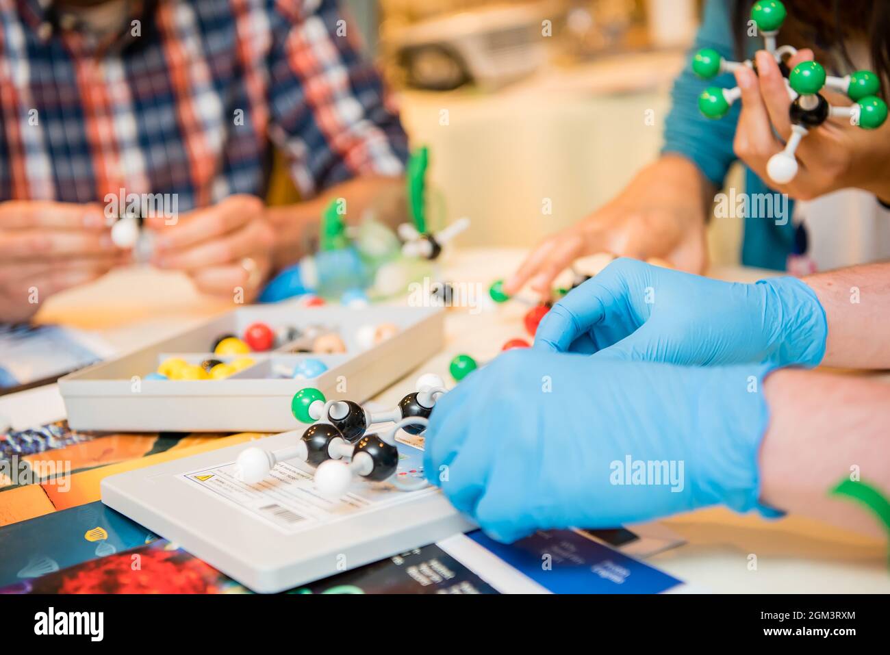 Kids wearing latex gloves for science experiment Stock Photo Alamy