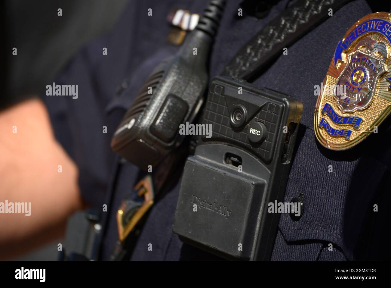 A police officer in Santa Fe, New Mexico, wears a bodyworn camera, or