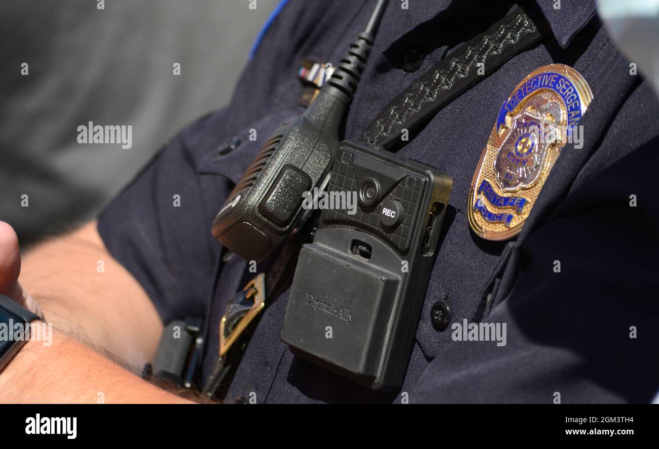A police officer in Santa Fe, New Mexico, wears a bodyworn camera, or
