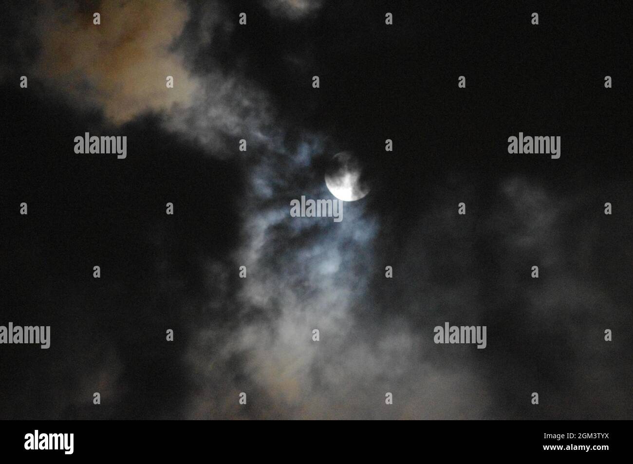 Hazy moon night sky - Altocumulus Stock Photo