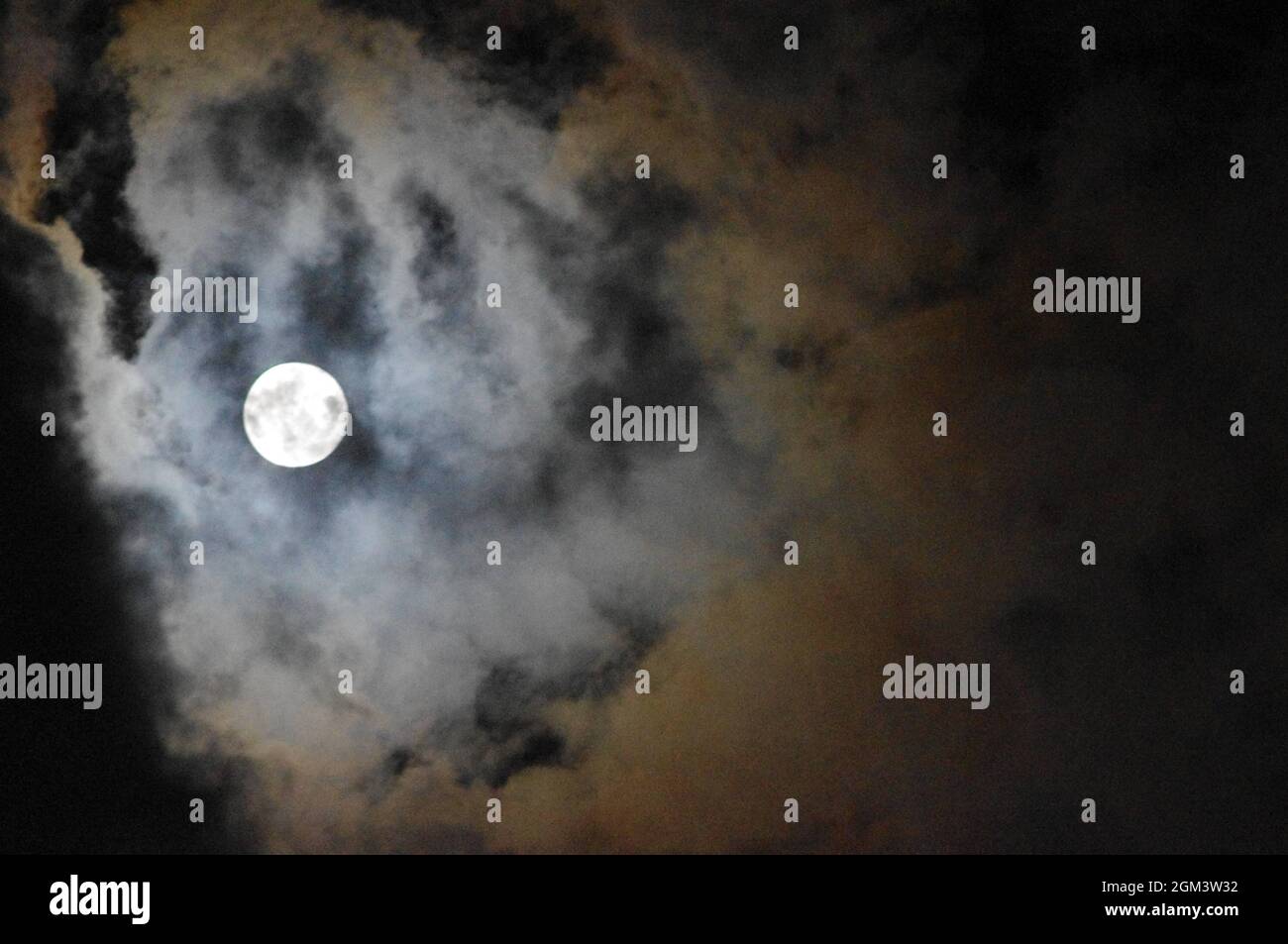 Hazy moon night sky - Altocumulus Stock Photo