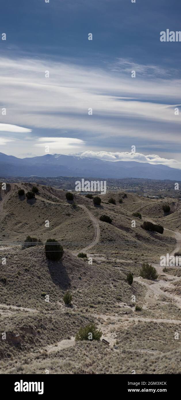 Sandy trails and foothills to the Sangre de Cristos Mountains near Española, New Mexico Stock Photo