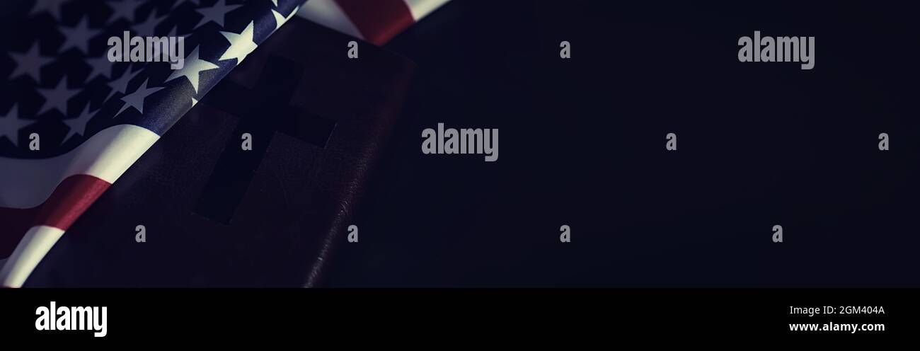 American flag and holy bible book on mirror background. Symbol of the ...