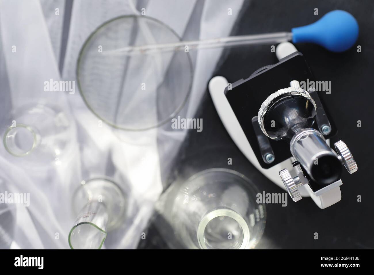 Drug Testing Microscope Laboratory research. Drug testing. Chemical experiments in the ...