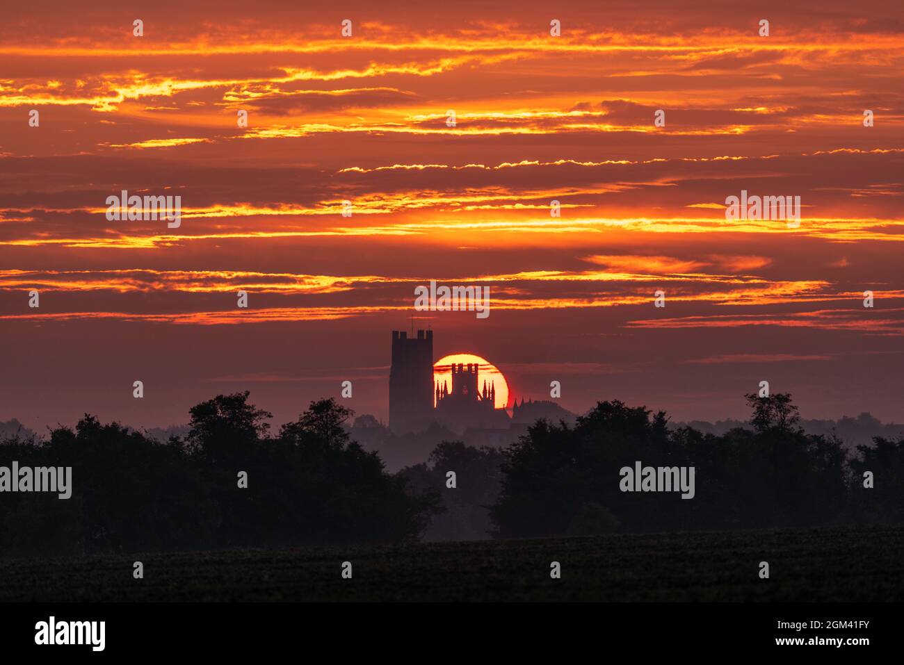 Sunrise behind Ely Cathedral, Cambridgeshire Stock Photo