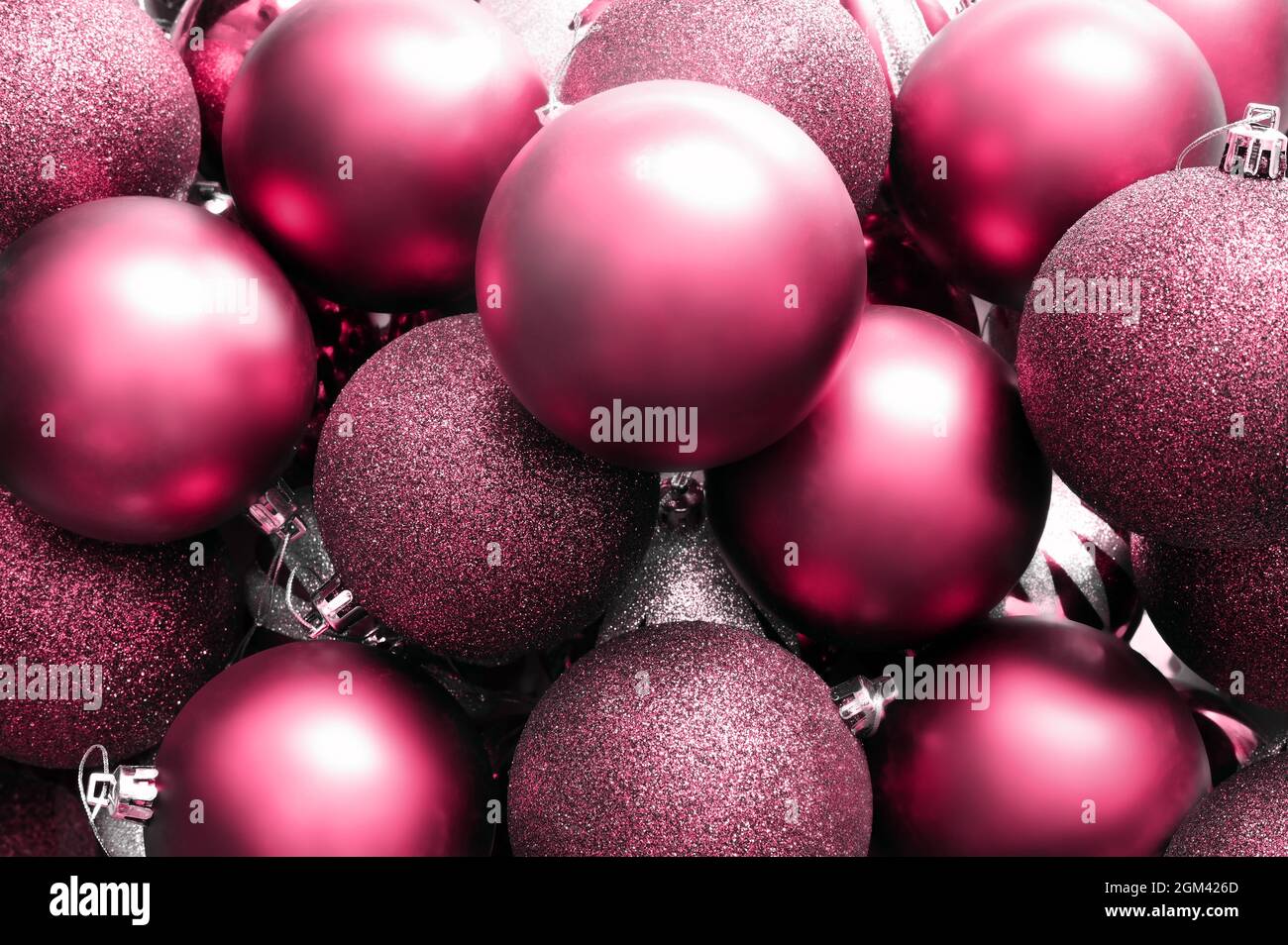 Glitter Christmas balls red background. Holiday concept. Stock Photo