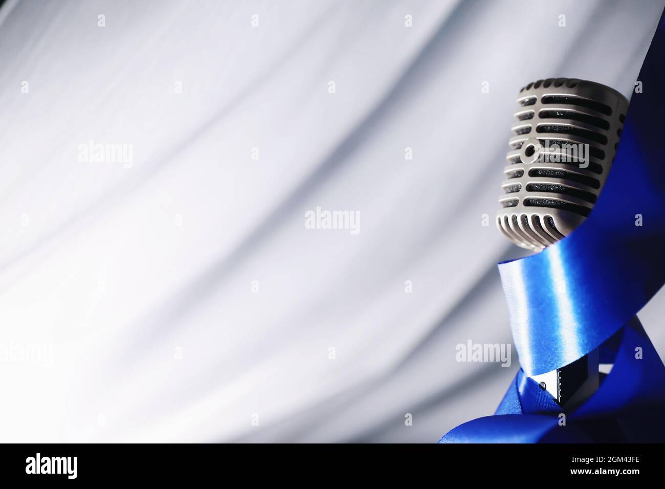 Stand with a retro microphone. Microphone on a tripod. Performance of