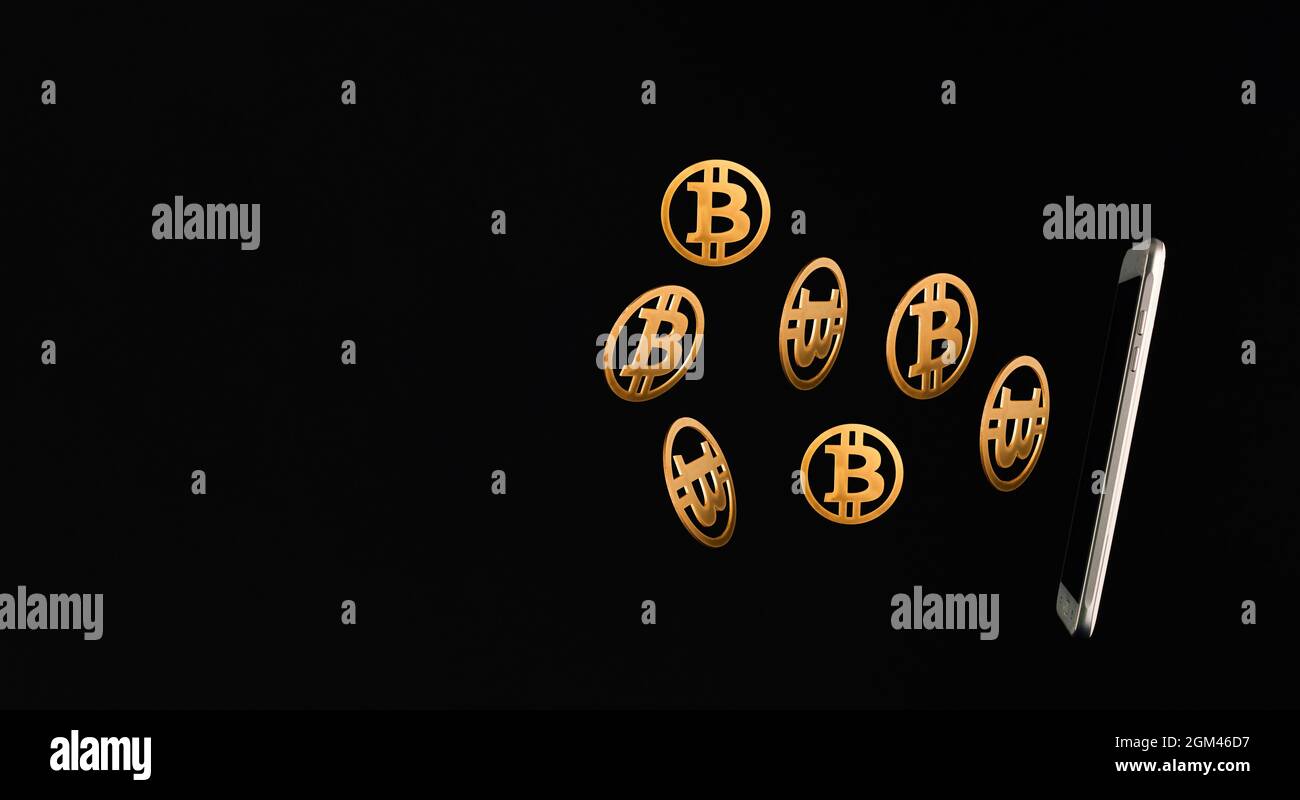 Mobile phone with bitcoins flying on a black background with copy space.  Price surprise growth concept. Mining or blockchain technology for  cryptocurr Stock Photo - Alamy