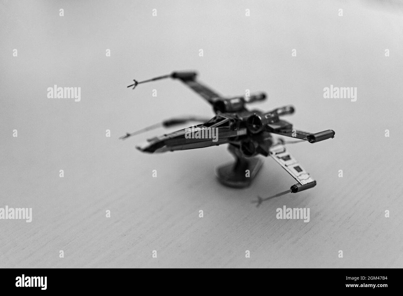 Grayscale shot of a small aircraft model Stock Photo