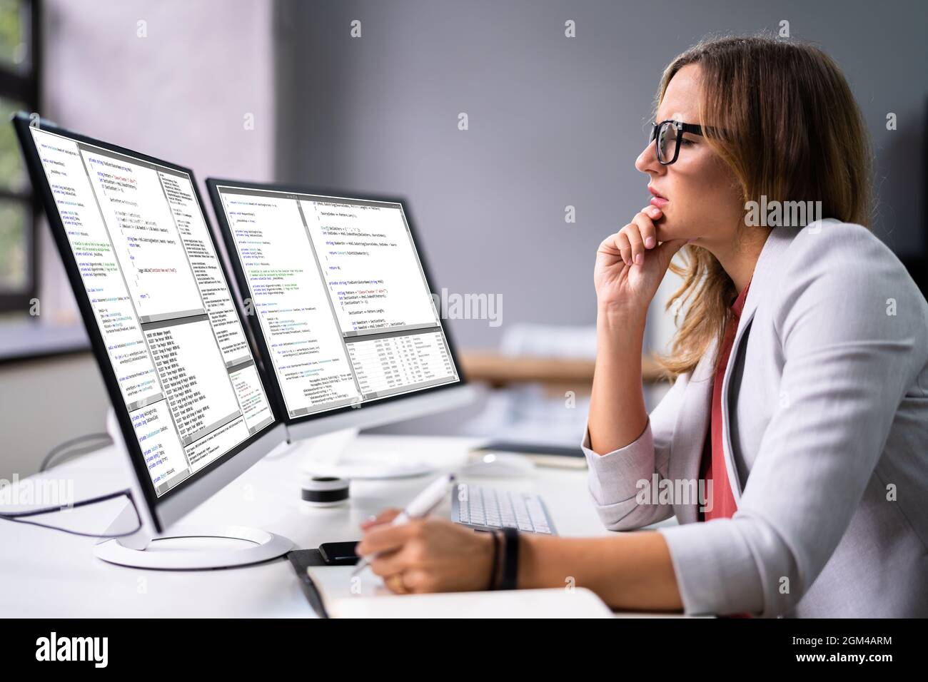 Developer Programmer Woman Coding Software On Computer Stock Photo