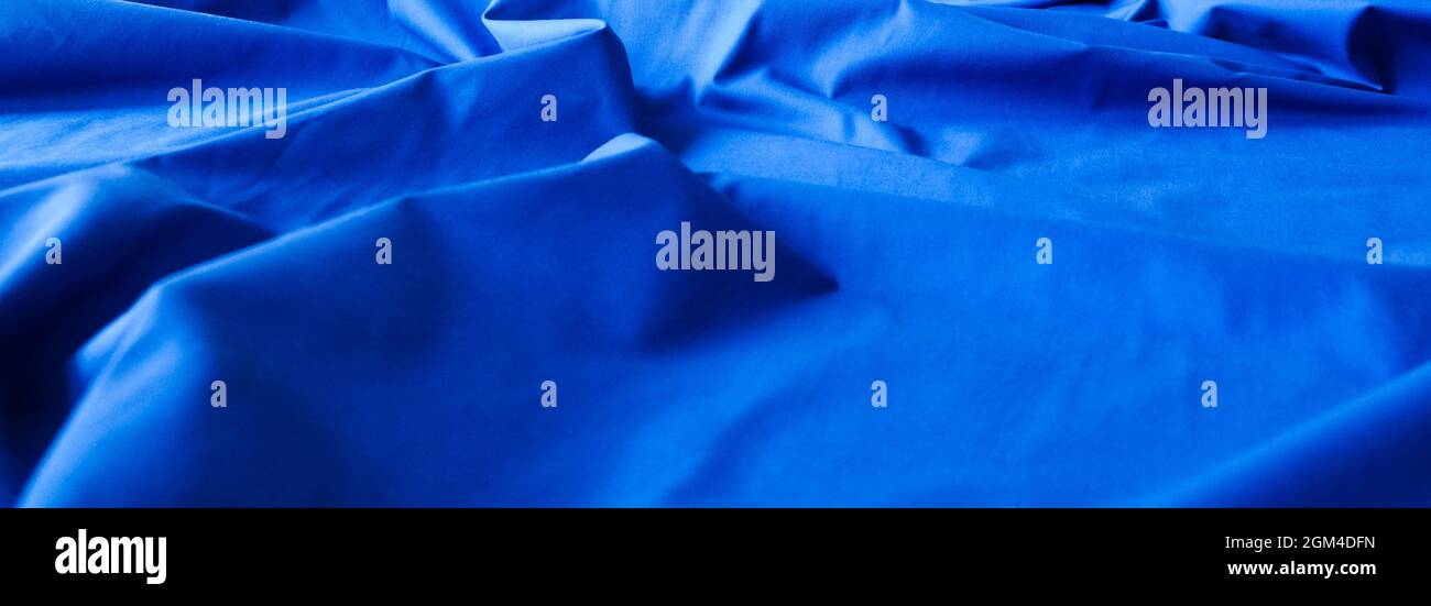 Abstract blue cotton background, piece of fabric, dark blue fabric ...