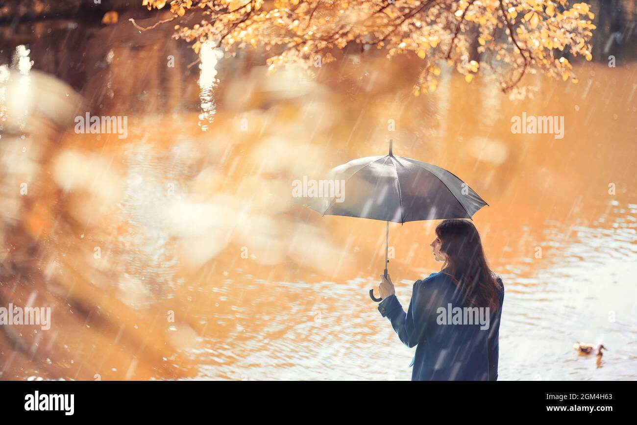 Pregnant woman on a walk in the park Stock Photo - Alamy