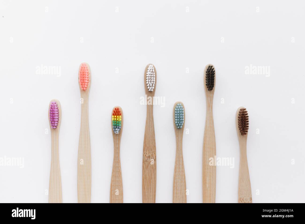 Wooden bamboo toothbrushes isolated on white background Stock Photo - Alamy
