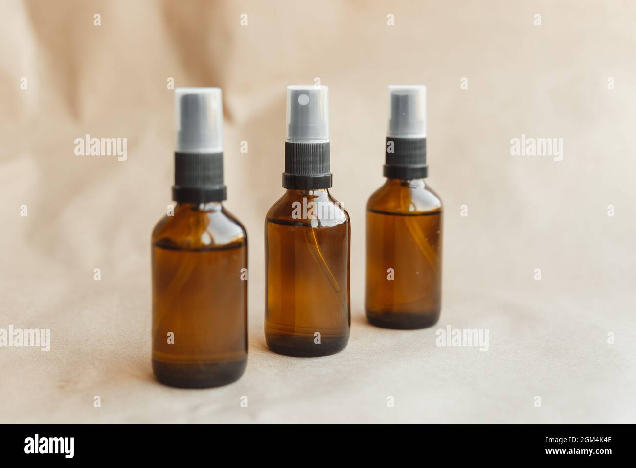 Set of amber bottles for essential oils and cosmetics. Glass bottle