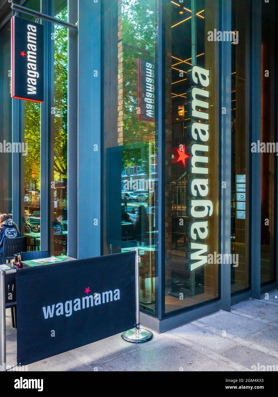 Wagamama Restaurant Shoreditch London - Wagamama Asian Fusion Food restaurant near Old Street Roundabout in London's Tech District. Stock Photo