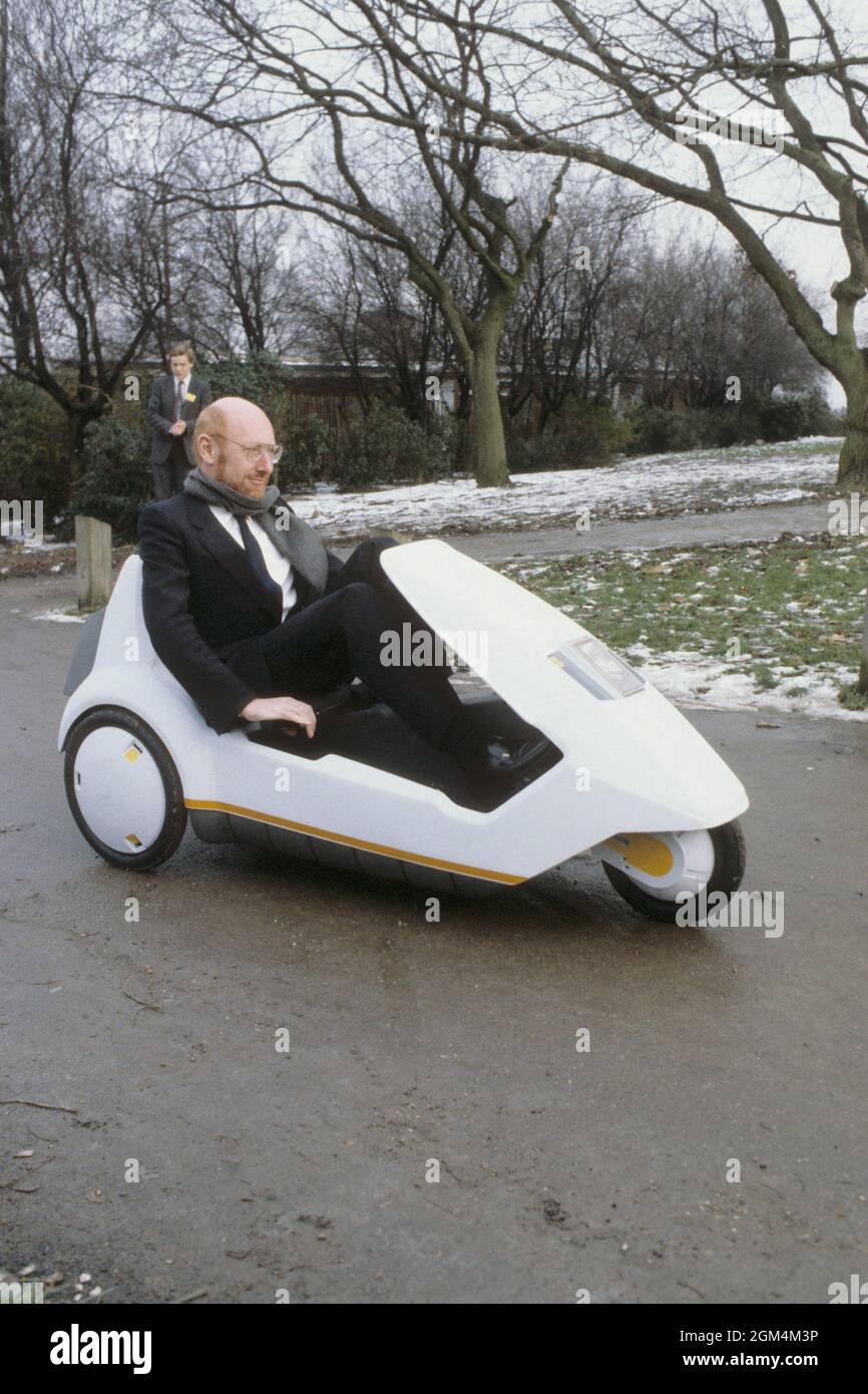 File photo dated 10/01/85 of Sir Clive Sinclair demonstrating his C5 electric vehicle, the battery-come-pedal powered trike, at Alexandra Palace. Home computing pioneer Sir Clive Sinclair has died at the age of 81, according to reports. Issue date: Thursday September 16, 2021. Stock Photo