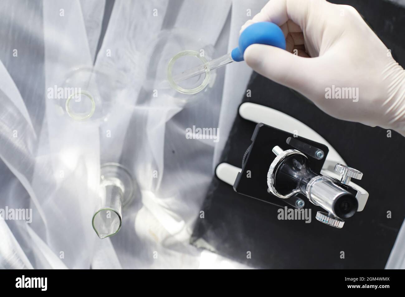 Drug Testing Microscope Laboratory research. Drug testing. Chemical experiments in the ...