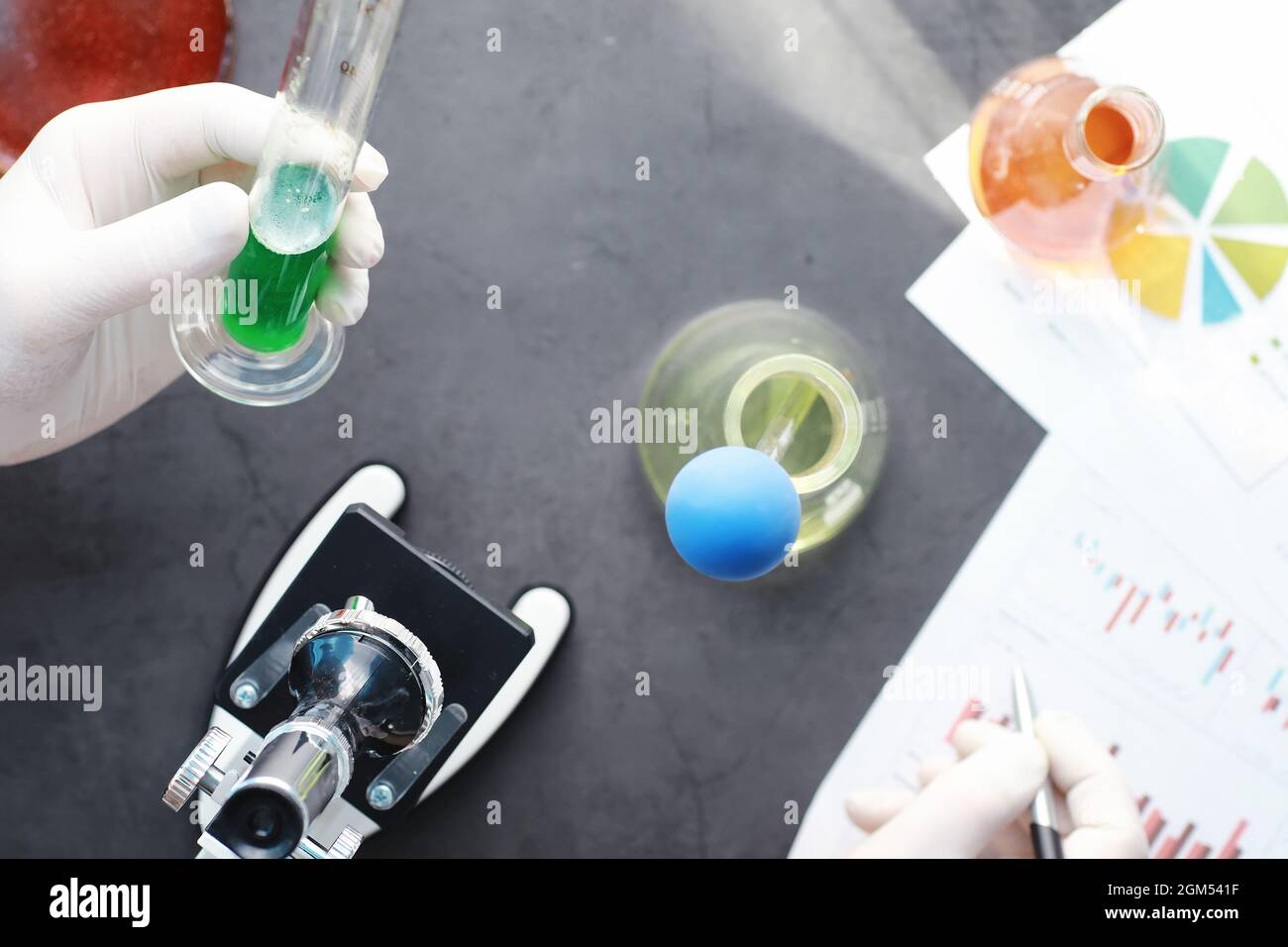 Drug Testing Microscope Laboratory research. Drug testing. Chemical experiments in the ...