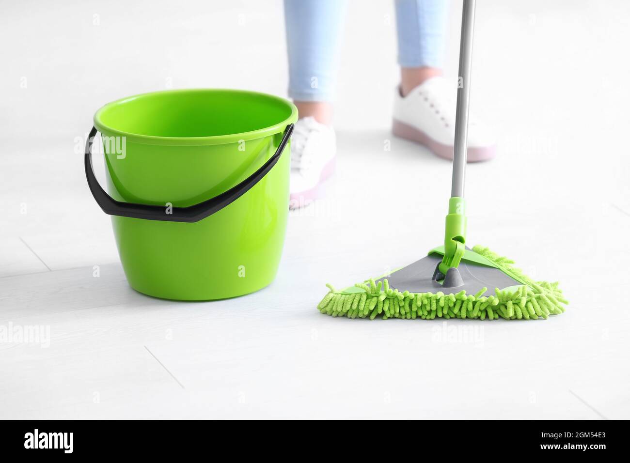 Cleaning service professional with mop indoors, closeup Stock Photo - Alamy