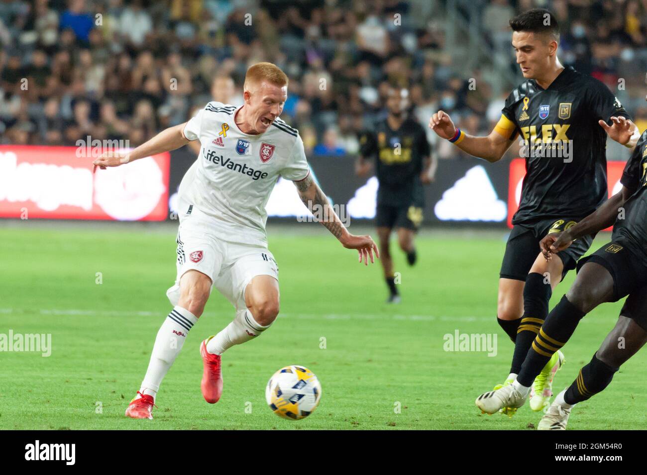 Real Salt Lake defender Justen Glad (15) passes the ball during a MLS game against the LAFC. The LAFC defeated Real Salt Lake 3-2 on Saturday, Sept. 1 Stock Photo