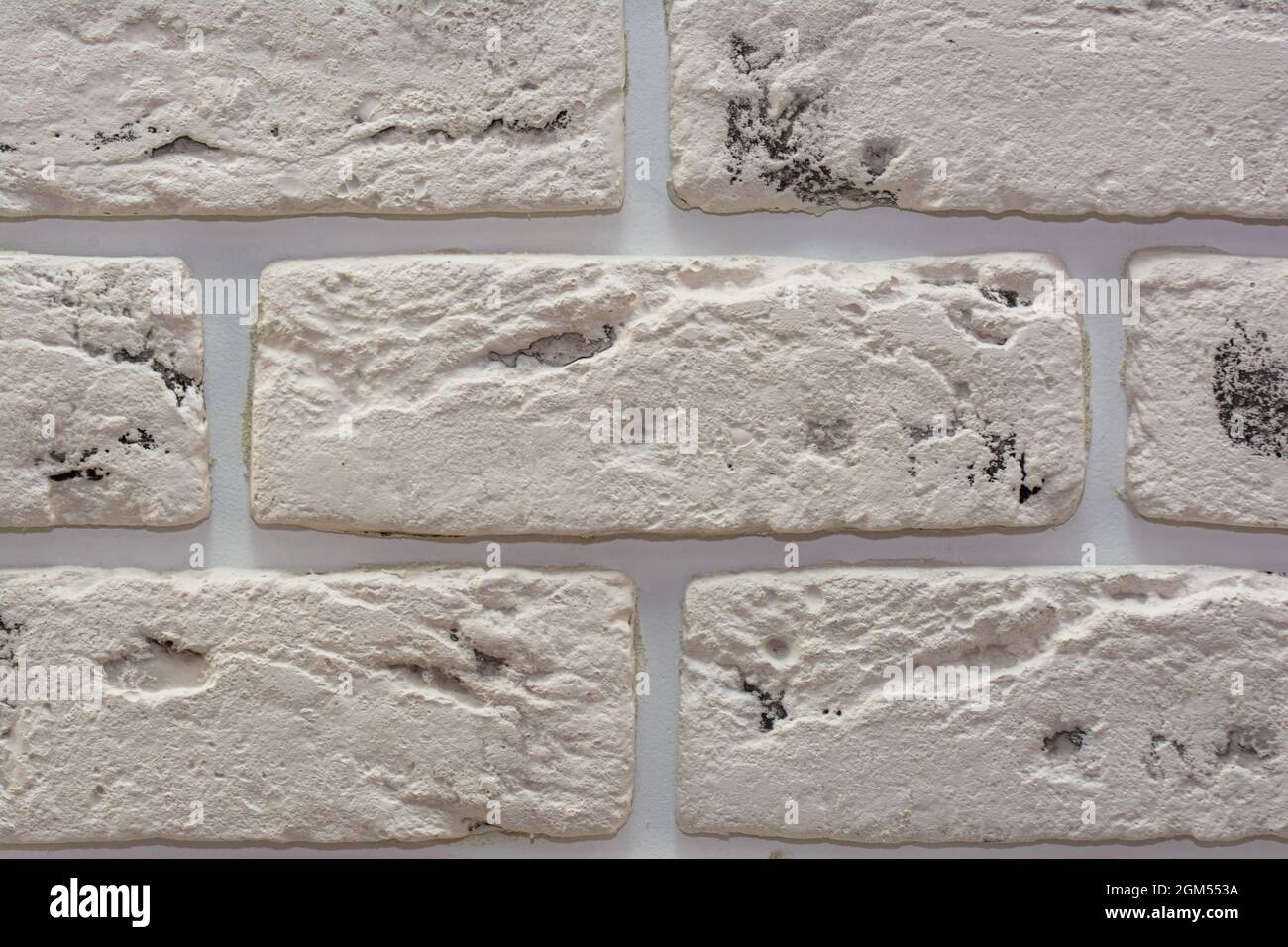 White textured white brick wall close up for background Stock Photo - Alamy