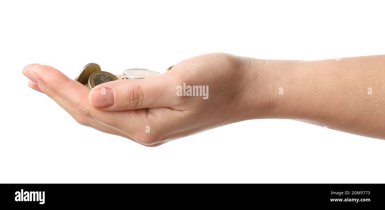 Female hand with coins on white background Stock Photo - Alamy