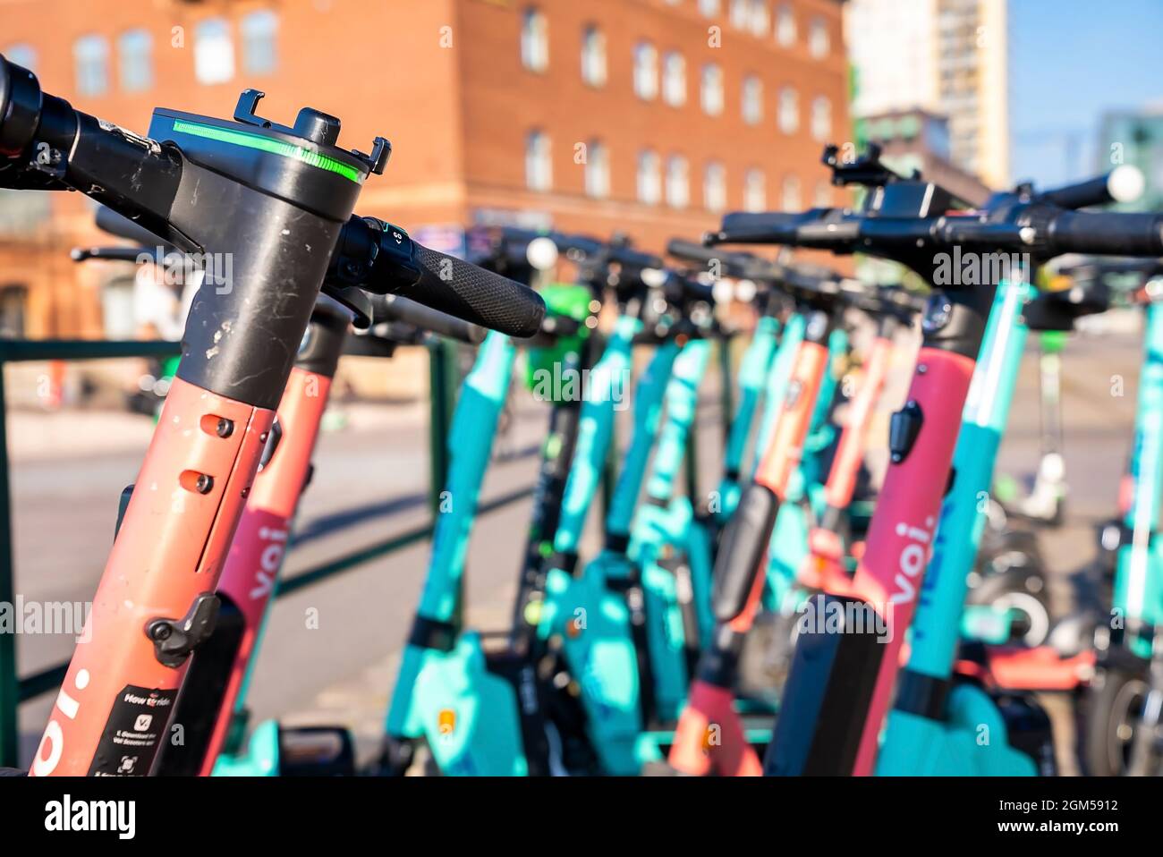 Electric scooters for hire popular mean of transportation Stock