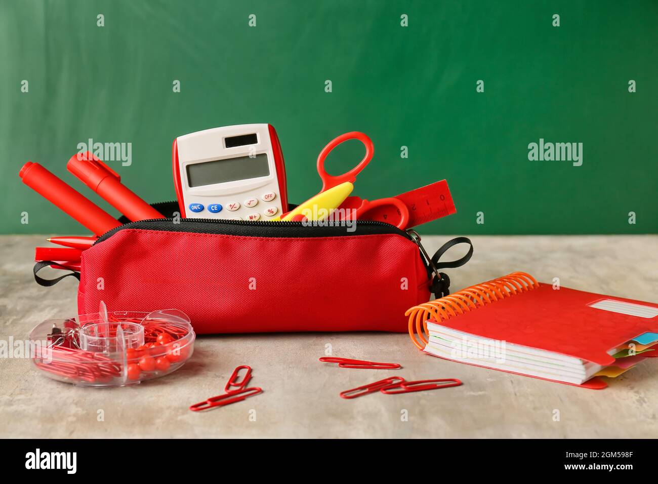 Red pencil case and pencils isolated on white background Stock Photo - Alamy
