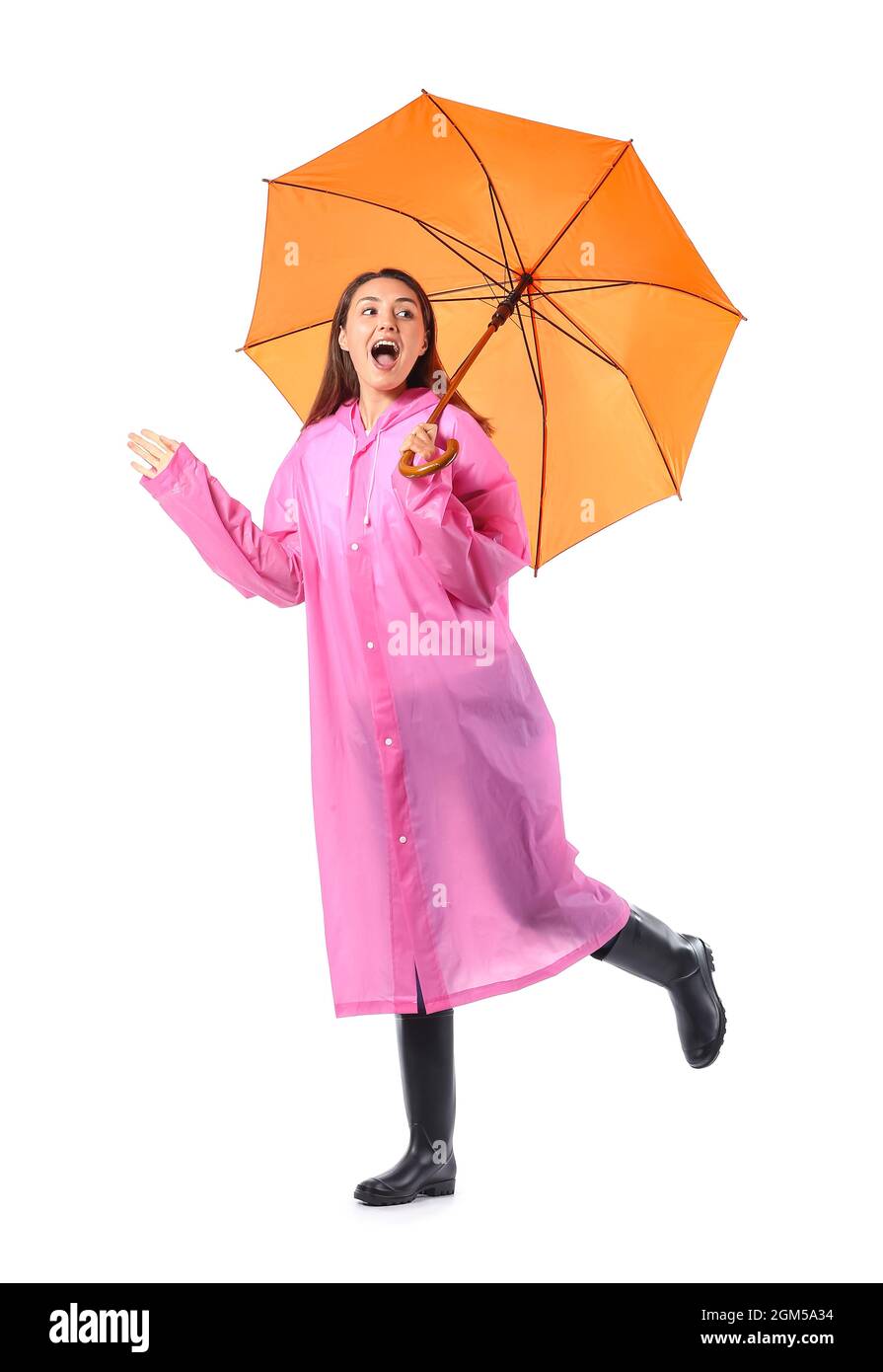 Beautiful young woman with umbrella on white background Stock Photo - Alamy