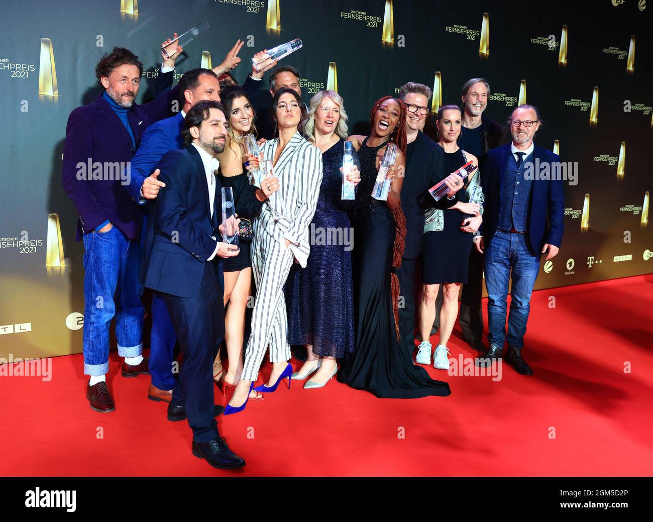 Cologne, Germany. 16th Sep, 2021. Quirin Berg, Anke Greifeneder, Hanno  Hackfort, Luisa Hardenberg, Soma Pysall, Roxana Samadi and Jobel Mokonzi  are the winners in the category "Best Drama Series" for "Para -
