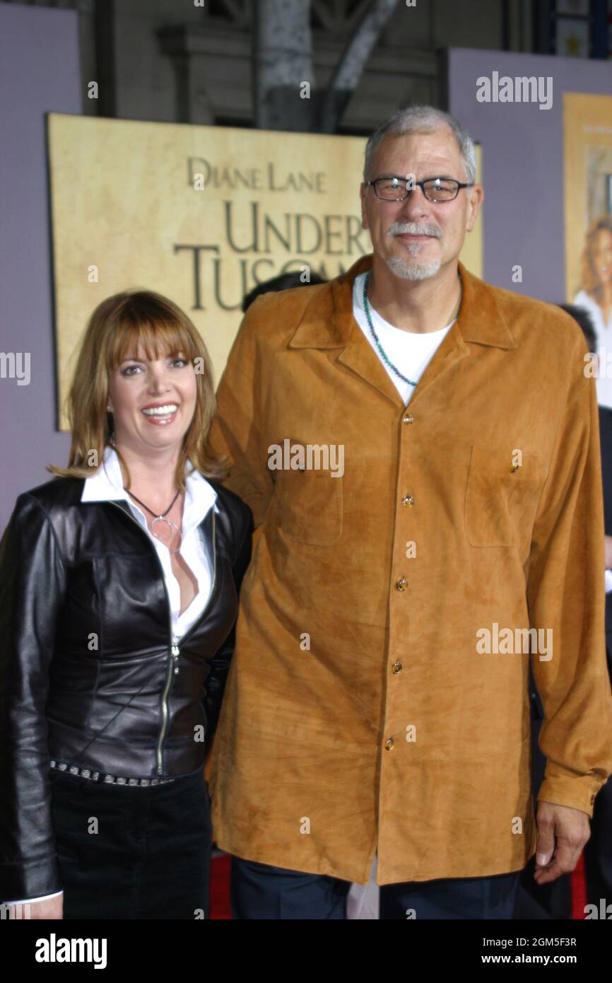 Phil Jackson, Jeanie Buss  09/20/03 UNDER THE TUSCAN SUN at The El Capitan Theater, Hollywood Photo by Izumi Hasegawa/HNW/PictureLux Stock Photo