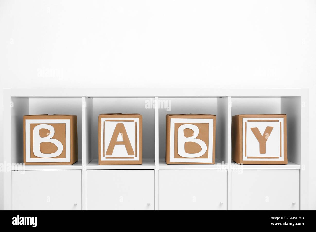 Beautiful decorations for baby shower party on white background Stock Photo  - Alamy