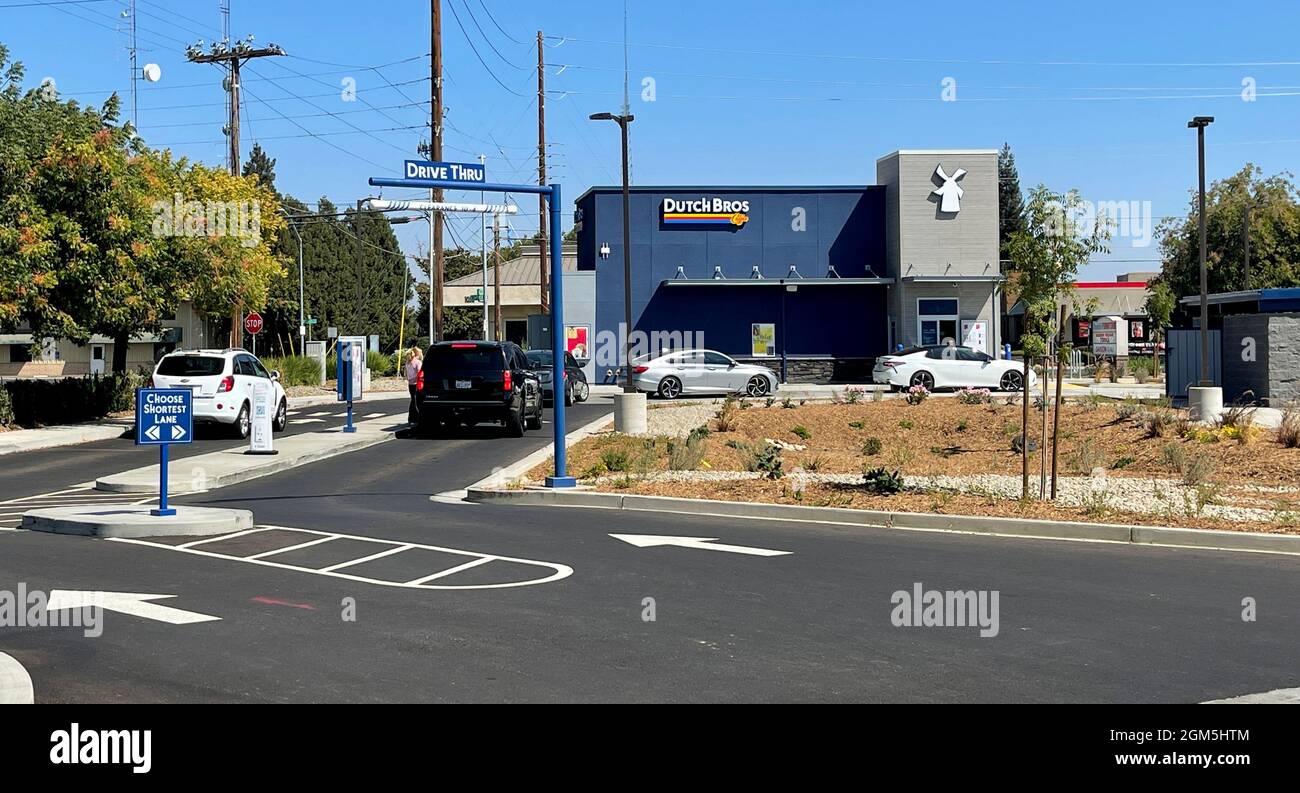 Modesto, CA, U.S.A. 16th Sep, 2021. One of the newest Dutch Bros in their 400 plus drive thrus opened in Modesto, California the first week of September, 2021. Dutch Bros began trading Wednesday on the New York Stock Exchange under ticker BROS. The company base out of Grants Pass, Oregon opened in the early 1990s. (Credit Image: © Marty Bicek/ZUMA Press Wire) Stock Photo