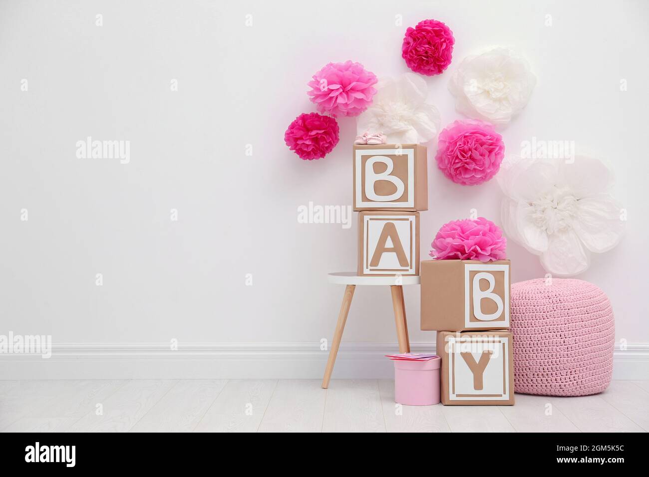 Beautiful decorations for baby shower party in light room Stock Photo -  Alamy