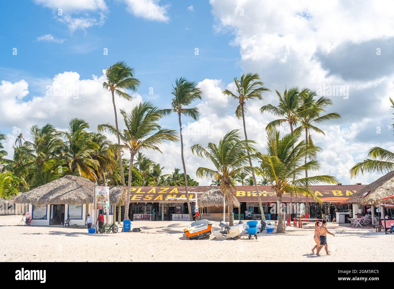 Dominican Beach Plaza with Palm Trees and Beautiful White Sands. Stock Photo