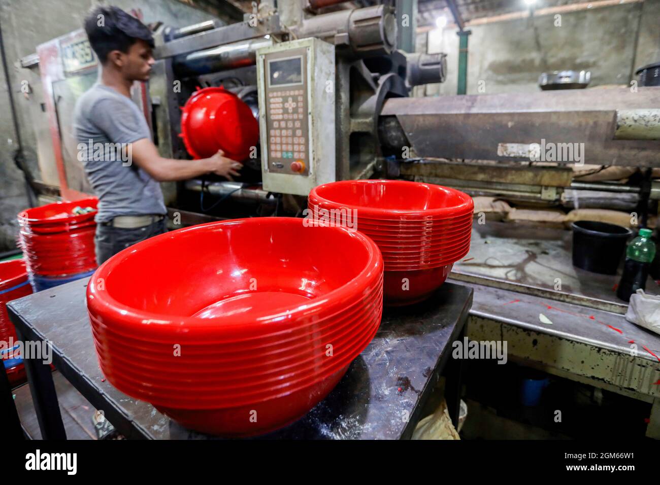 Dhaka, Bangladesh. 16th Sep, 2021. A labourer seen working at a Plastic
