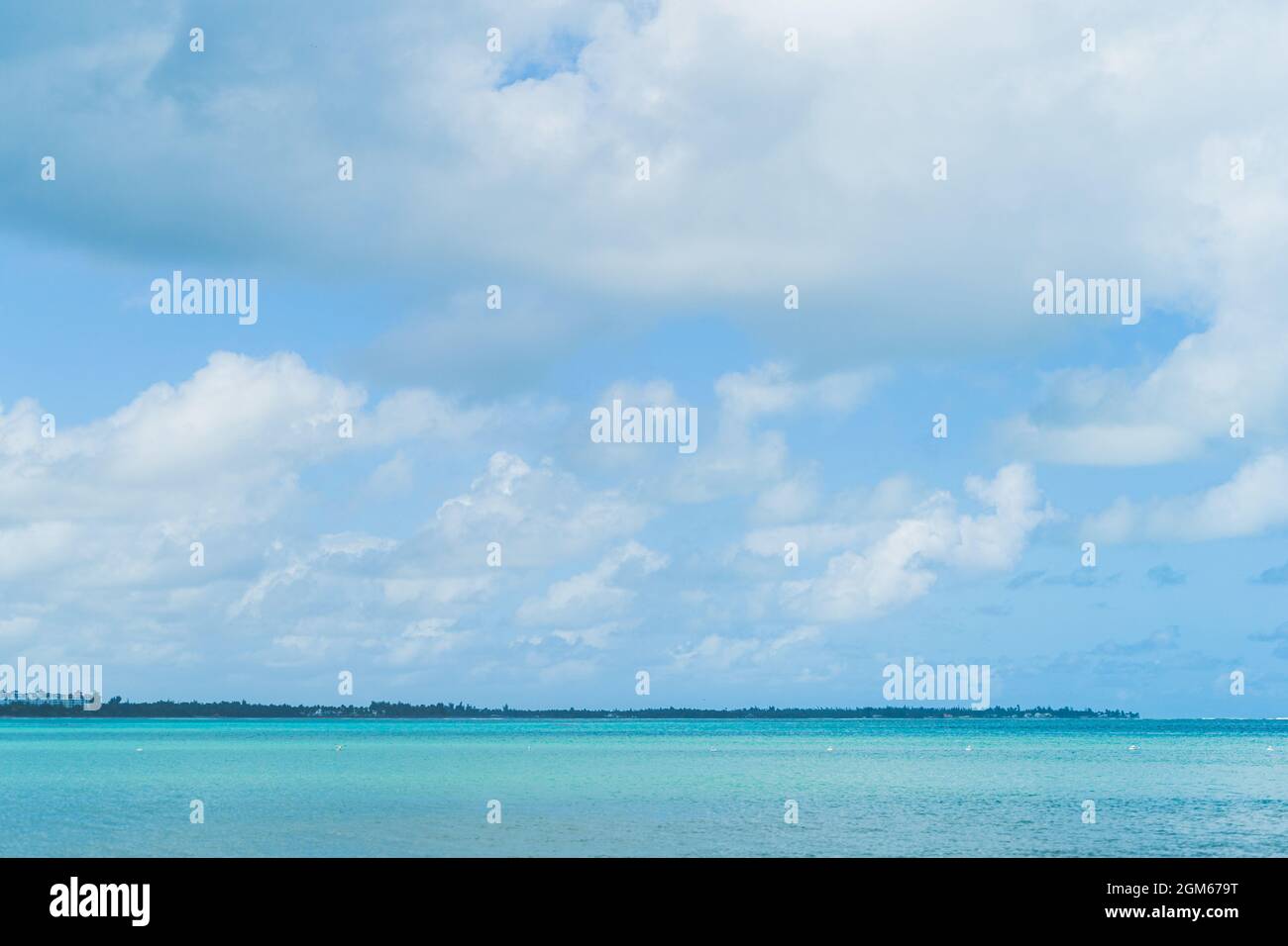 View from Luquillo beach in tropical Puerto Rico and white puffy clouds Stock Photo