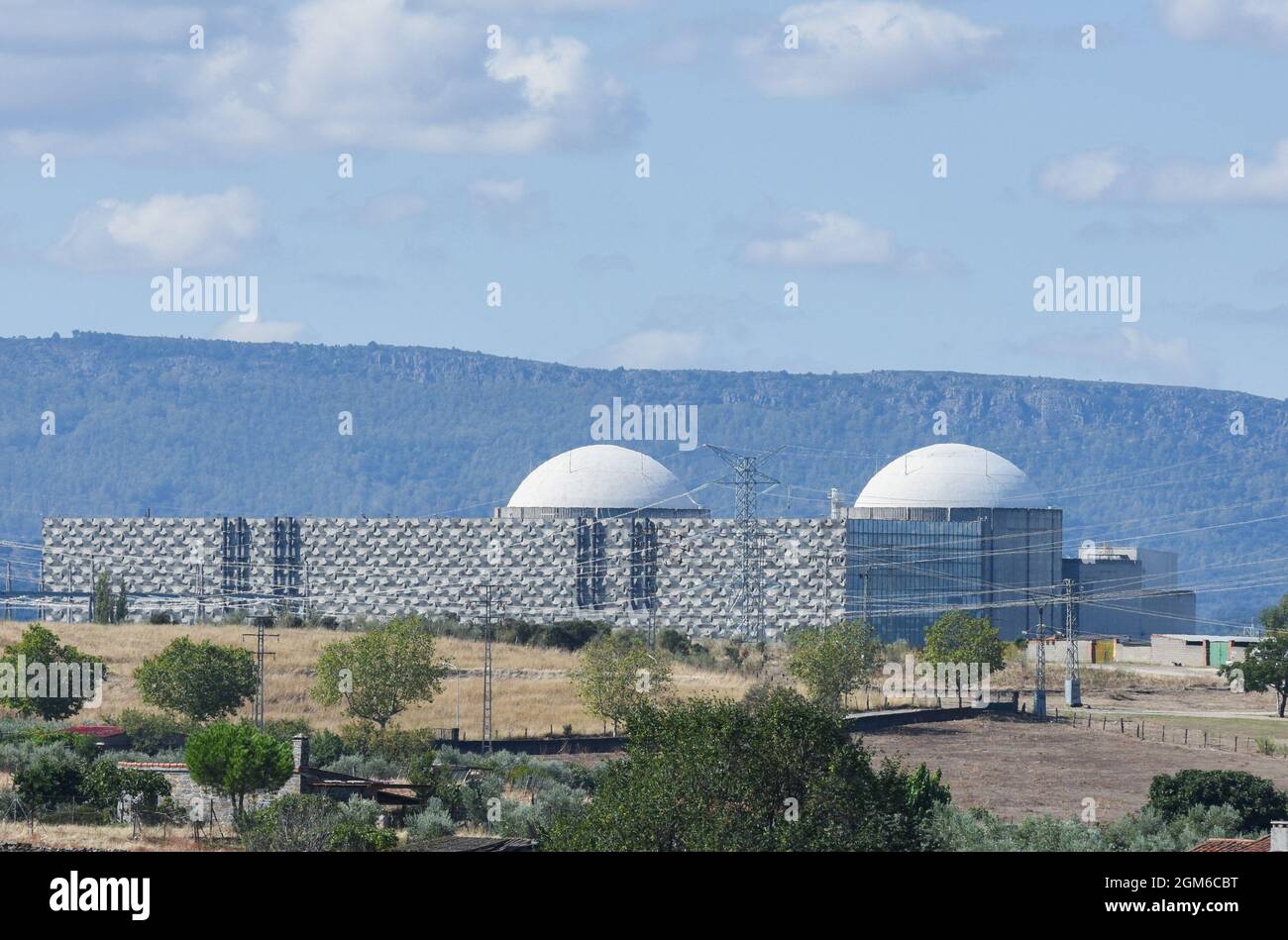 View of the Nuclear Power Plant of Almaraz in Caceres. Property of Iberdrola Generación Nuclear, S.A.U. (53%), Endesa Generación, S.A.U (36%) and Gas Natural Fenosa Generación, S.L.U. (11%), this is one of the nuclear power plants that could close because the generation of electricity could not be profitable for the owners with the Government measures. Spanish Government has targeted €2.6bn in “excess profits” from utilities that do not use gas but have benefited anyway from the way rising gas prices have driven electricity prices higher. However, Spain's nuclear power association said the ne Stock Photo
