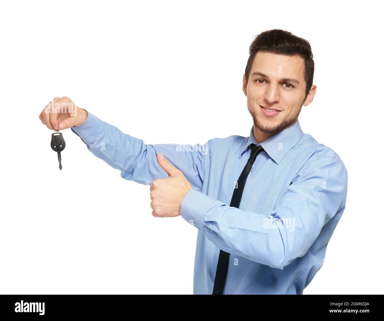Man in office wear holding car key on white background Stock Photo - Alamy