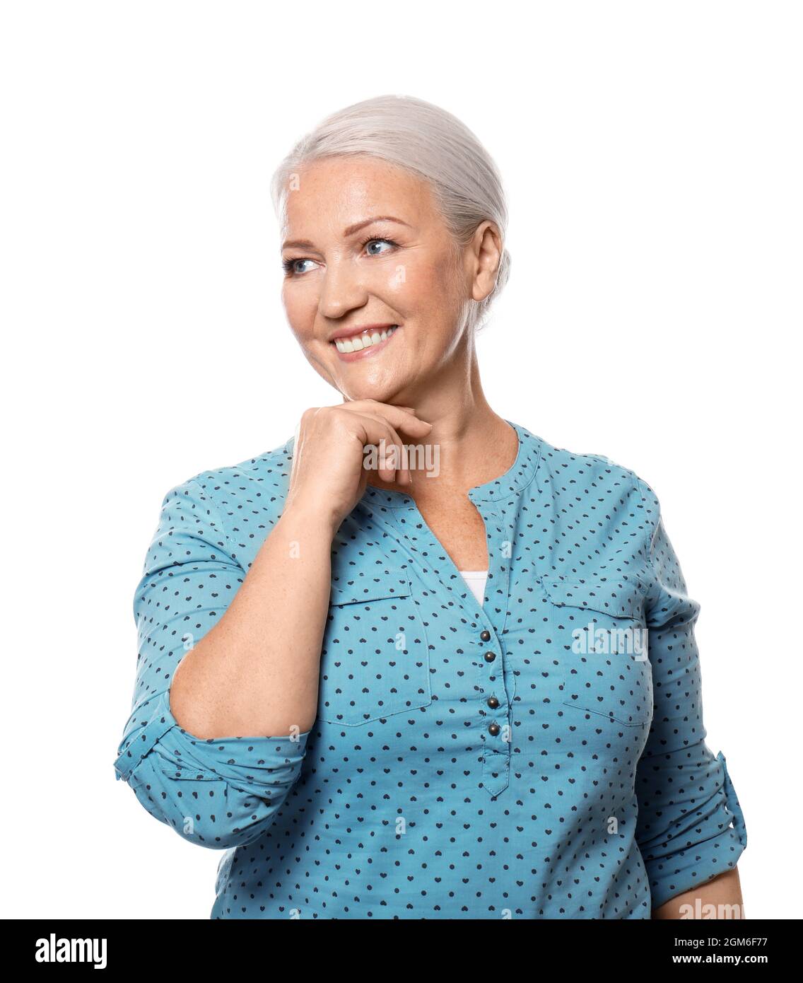 Portrait of smiling mature woman on white background Stock Photo - Alamy