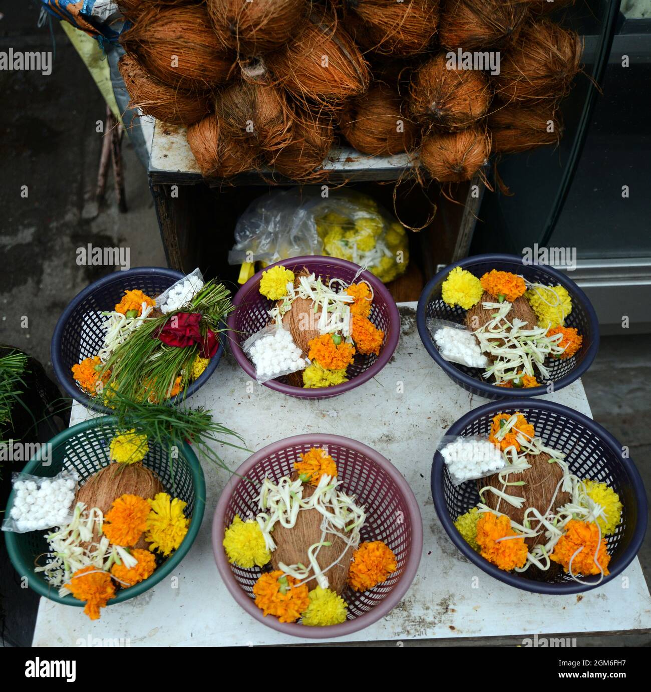 Puja plates at the Shreemant Dagdusheth Halwai Ganpati Hindu temple in Pune, India. Stock Photo