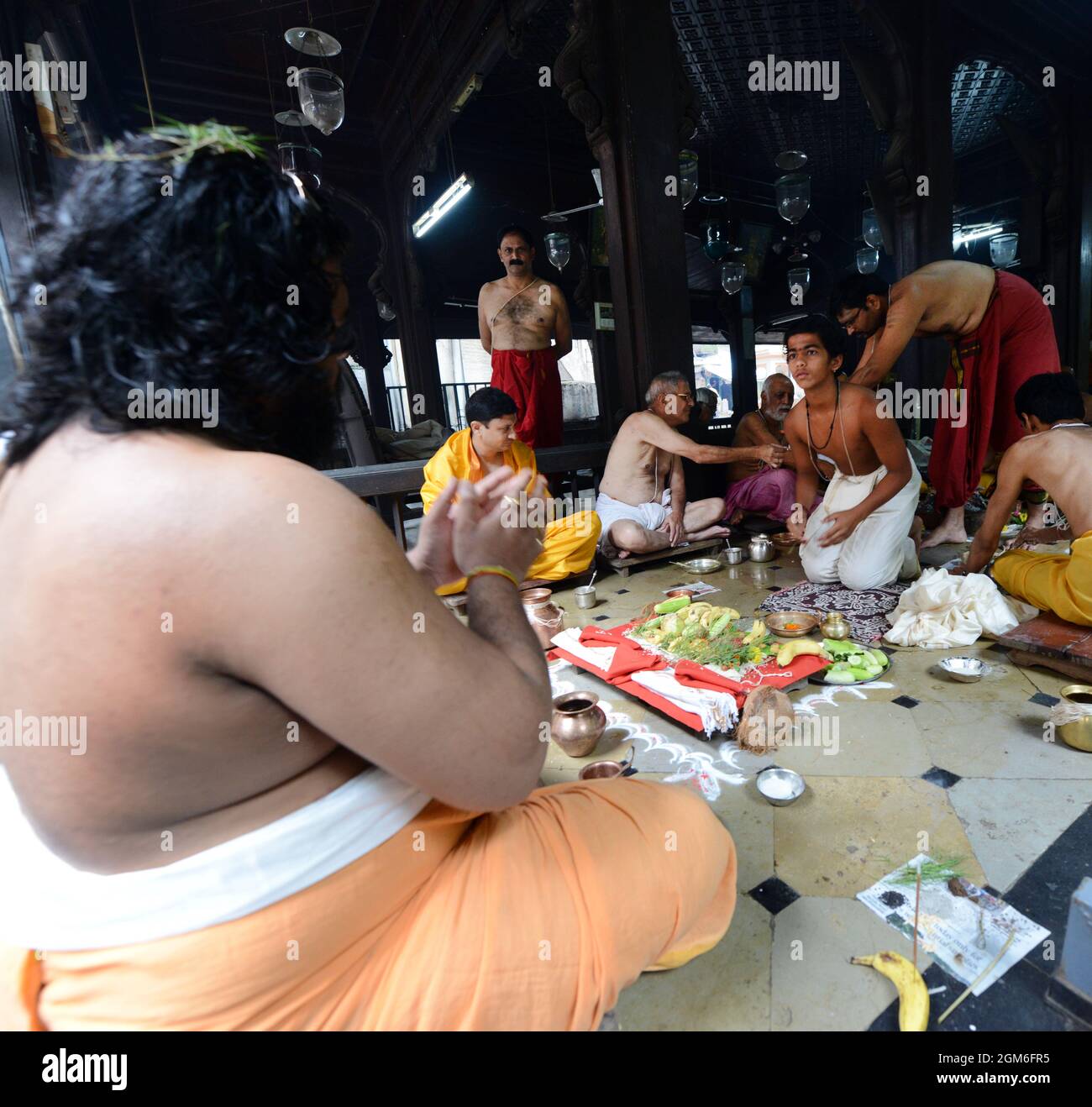 Marathi Hindu priests conducting a religious ceremony in a small temple in Pune, India. Stock Photo
