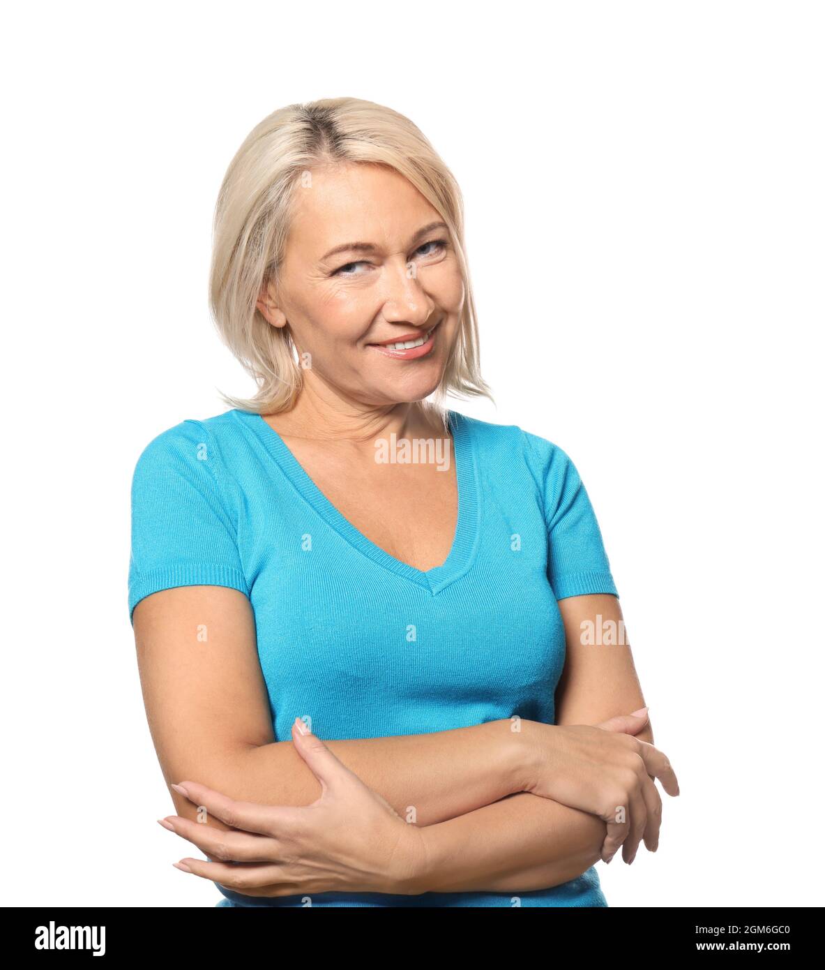 Portrait of smiling mature woman on white background Stock Photo - Alamy